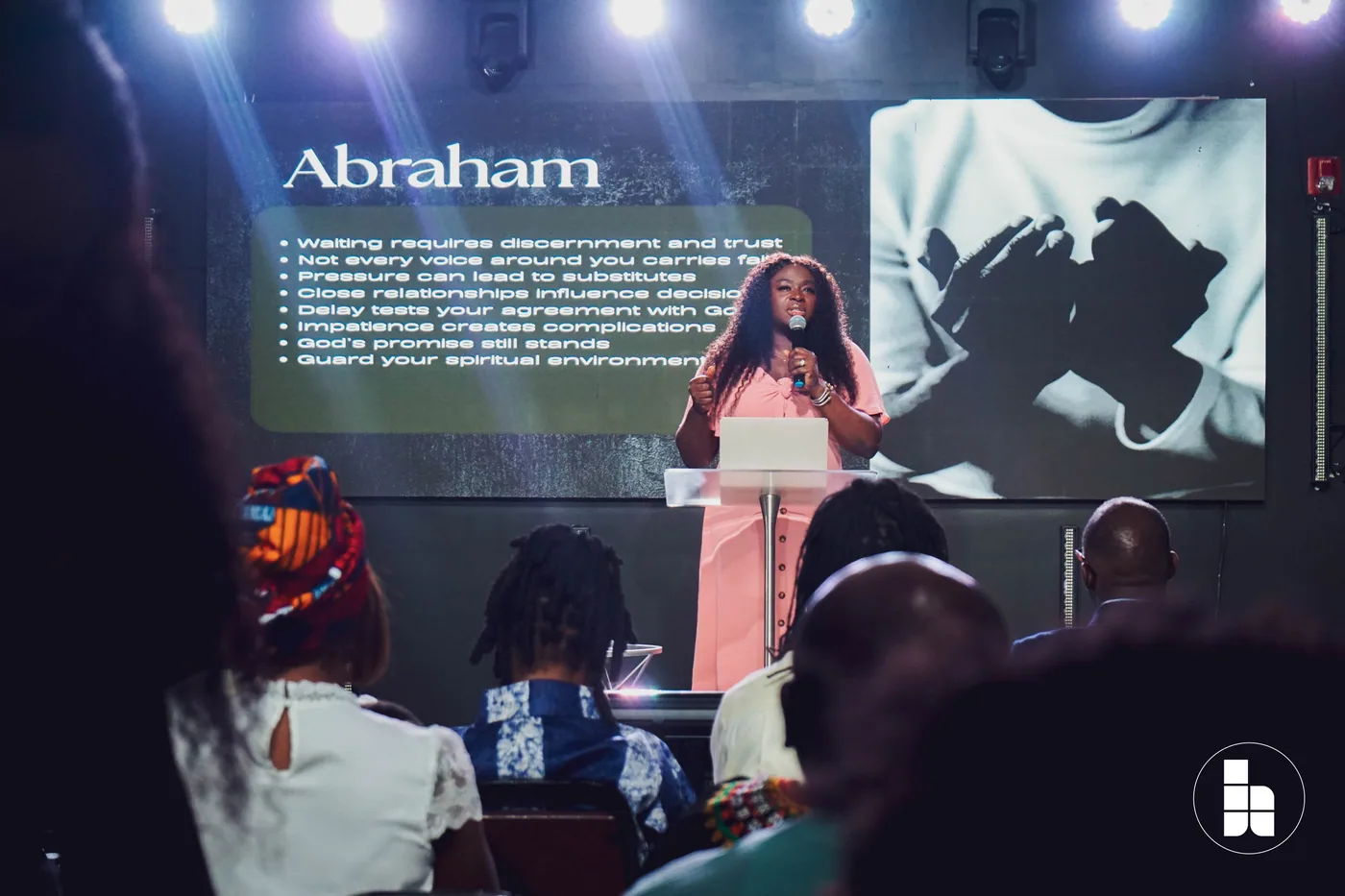 A pastor teaching from Scripture at Jubilee Place