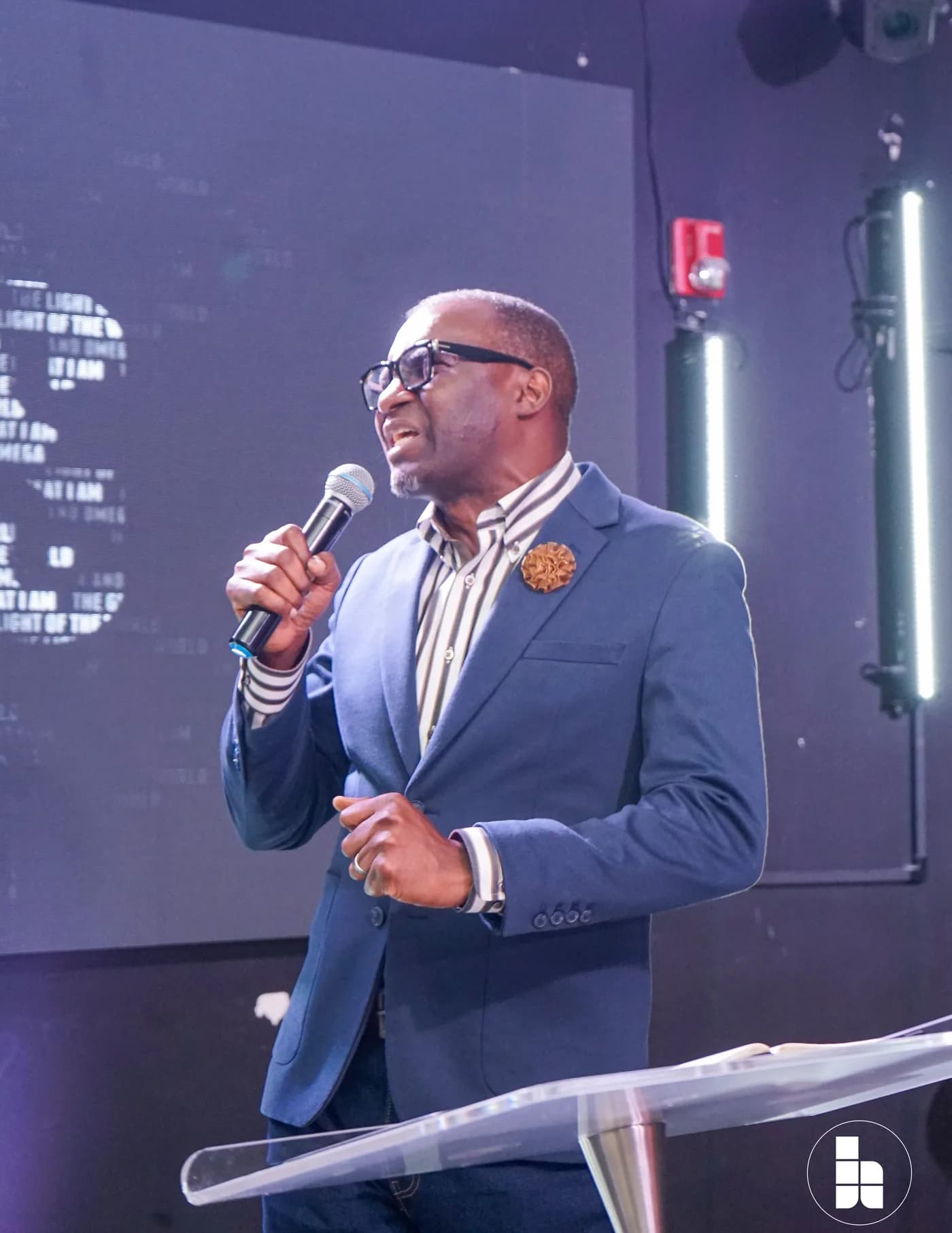 A pastor preaching during a Sunday service at Jubilee Place