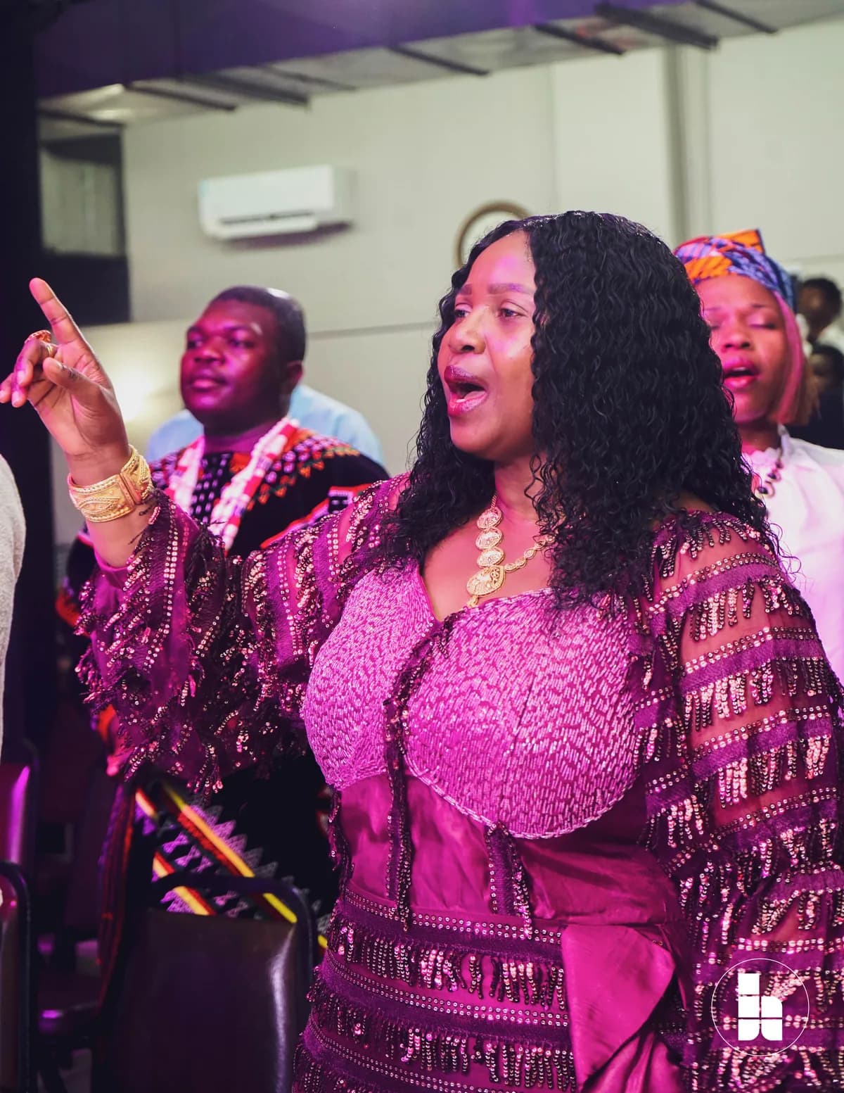 A member singing during worship