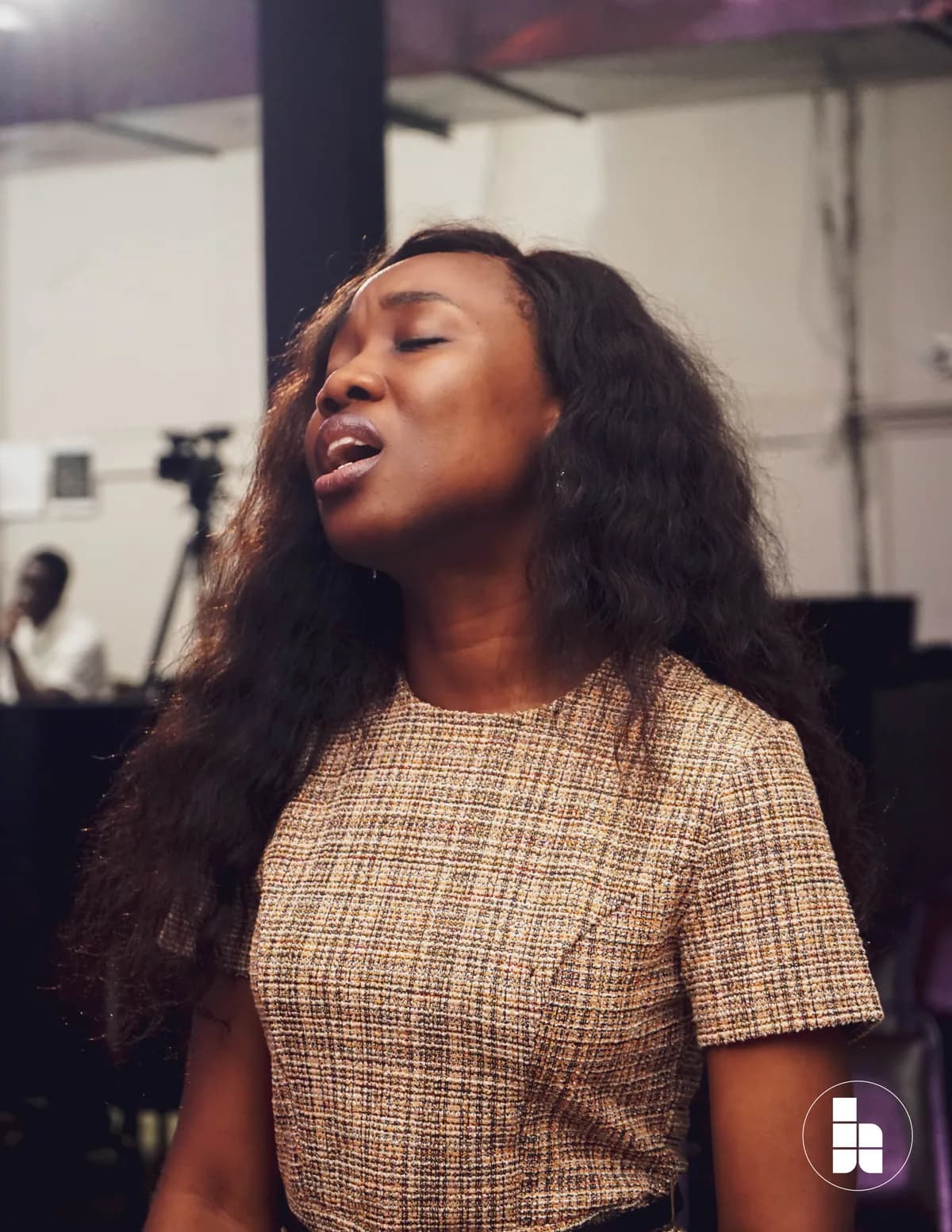 A member worshipping at Jubilee Place