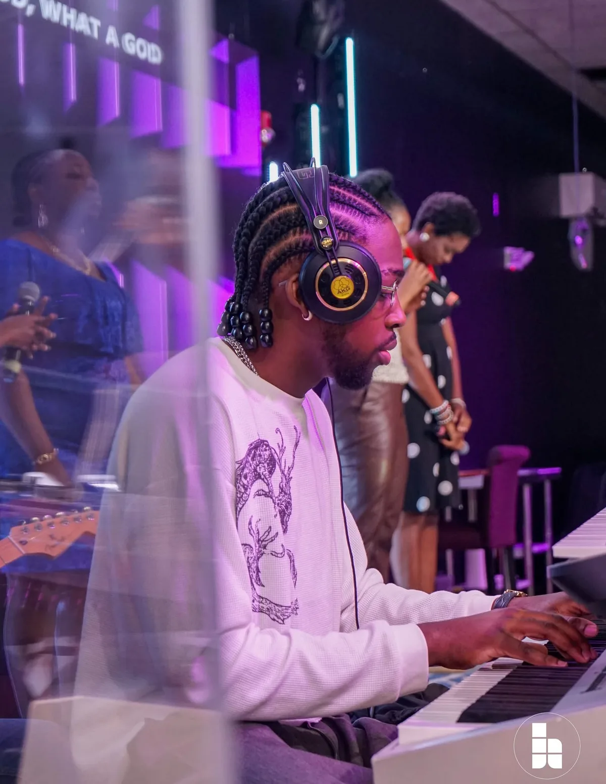 A keyboard player leading during worship