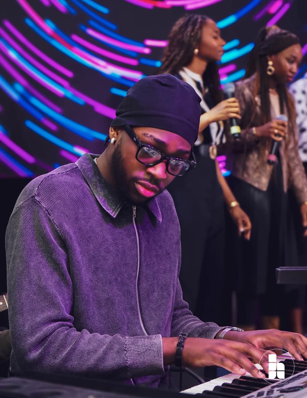 A young man singing during worship