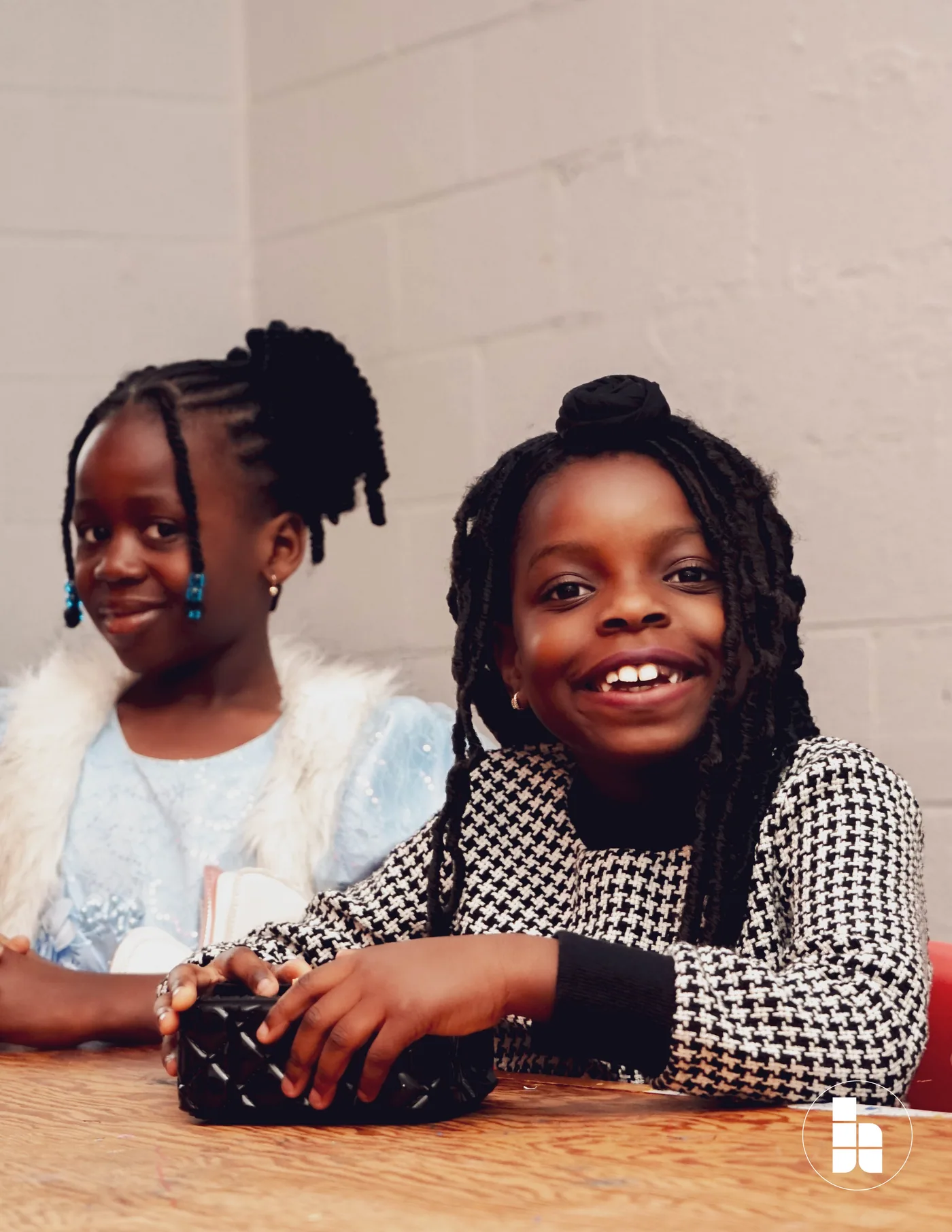 Two children smiling during Jubilee Kids