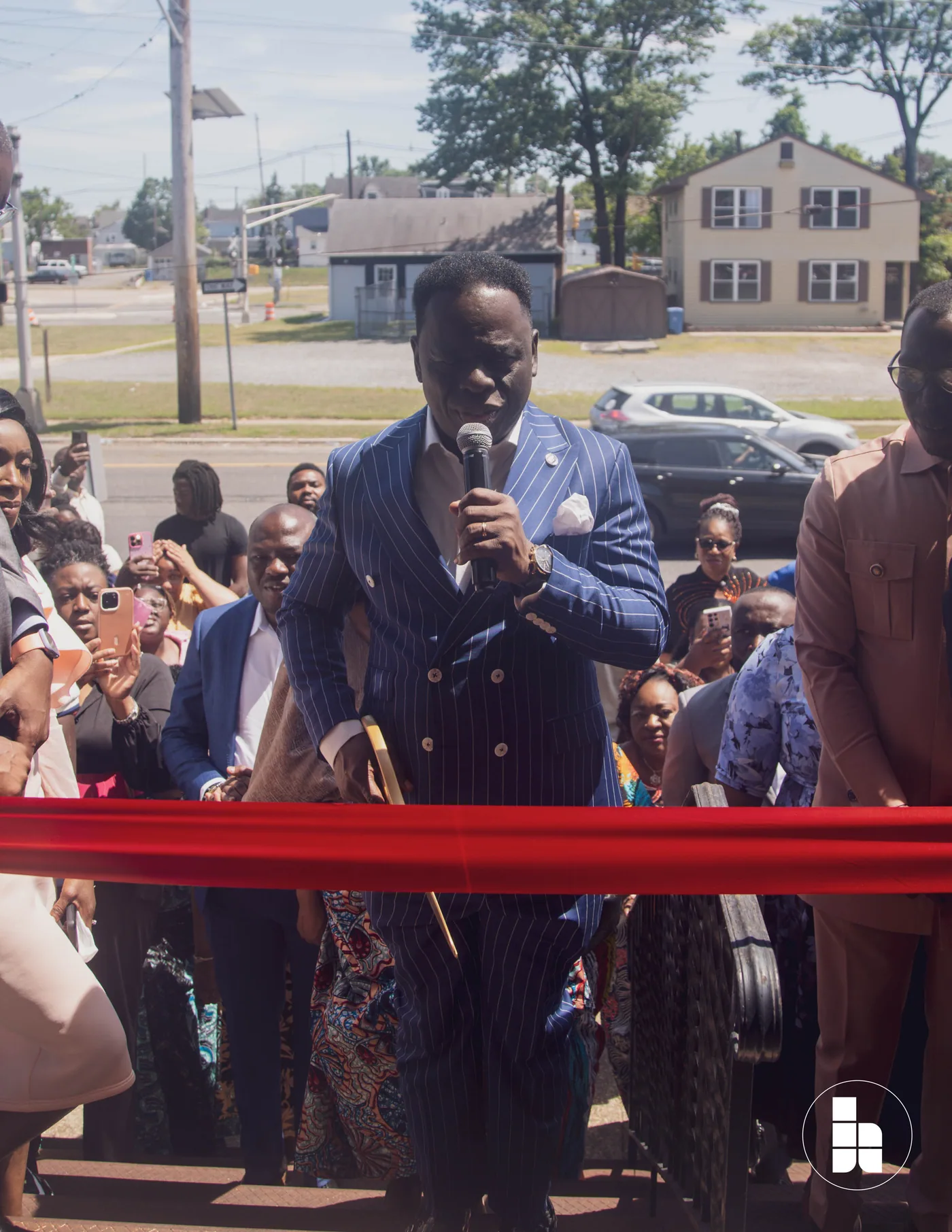 The ribbon-cutting outside the Jubilee Place building